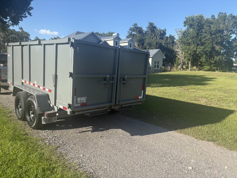 Rear gates of the 15-yard dump trailer for easy loading